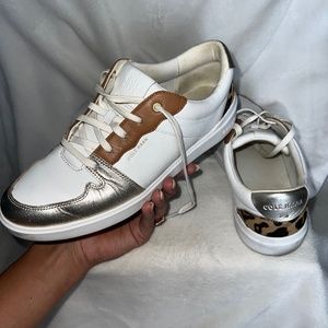 Coke Haan low top white and cheetah faux leather sneakers